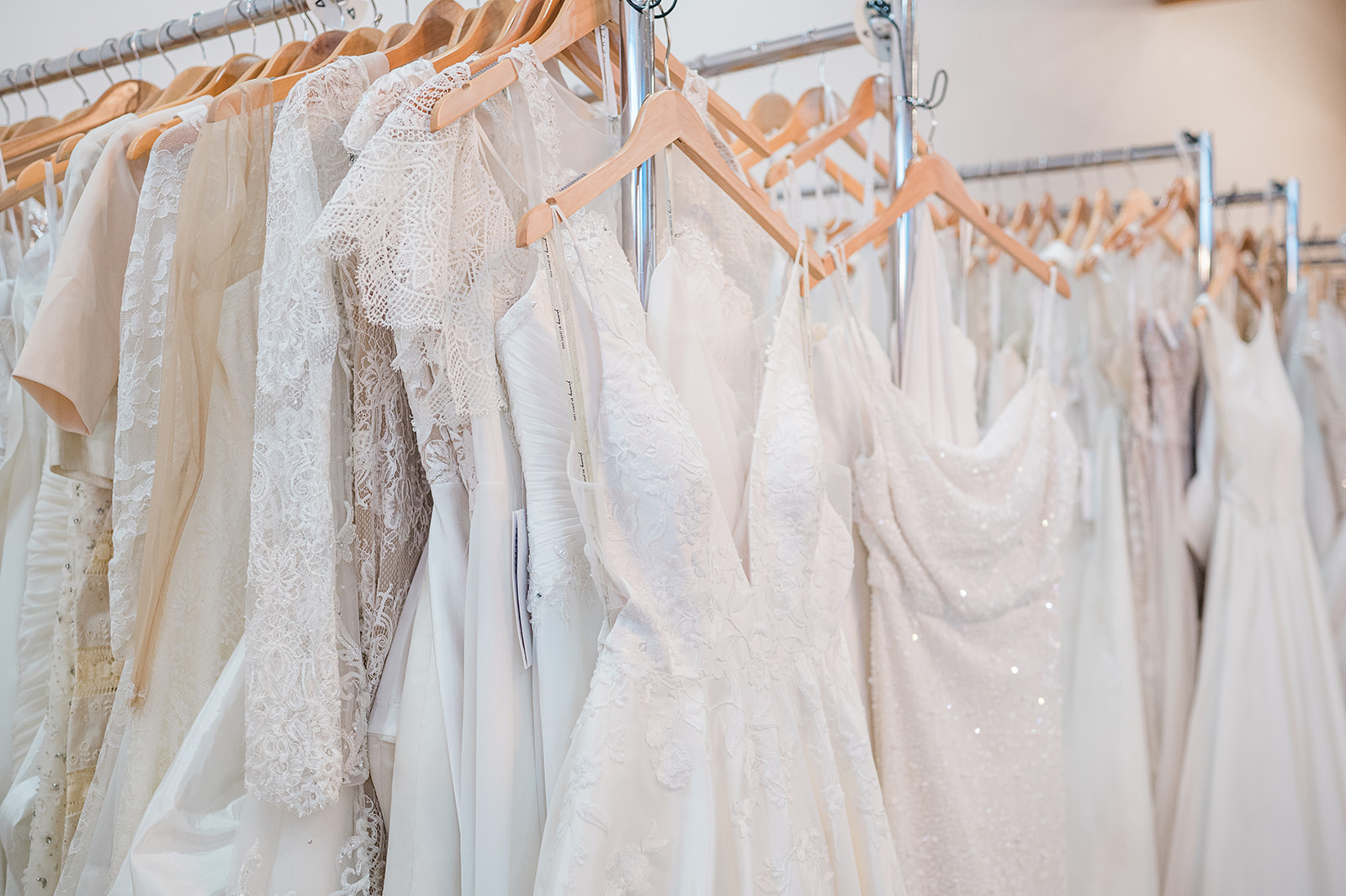 wedding dresses on rack